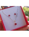 Collana con orecchini coccinella