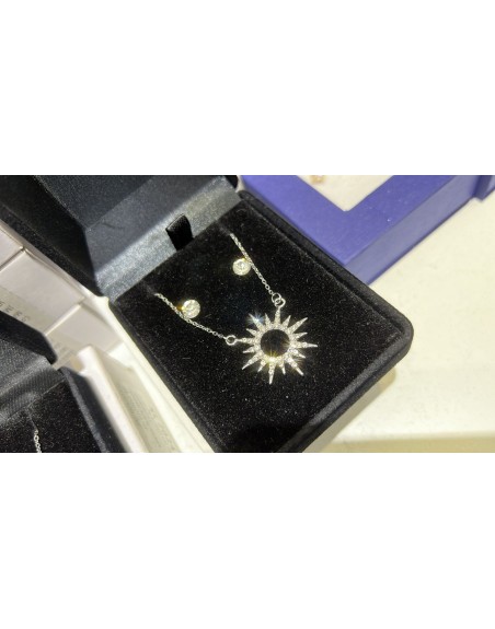 Collana con orecchino punto luce