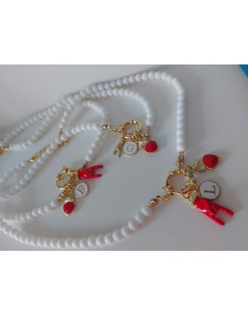 Collana palline bianca con simboli