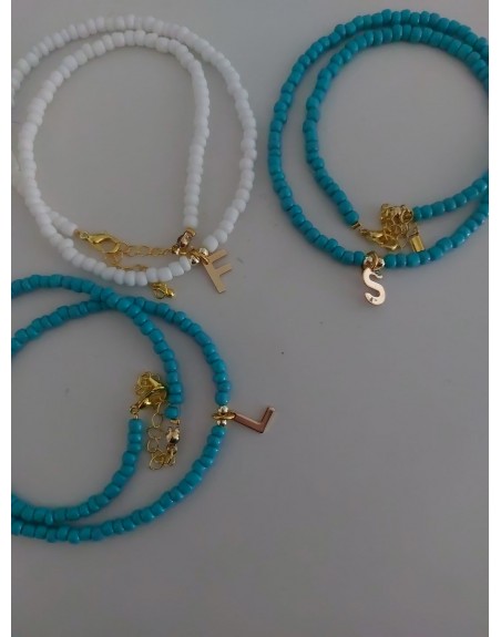Collana realizzata a mano con perline e lettera oro
